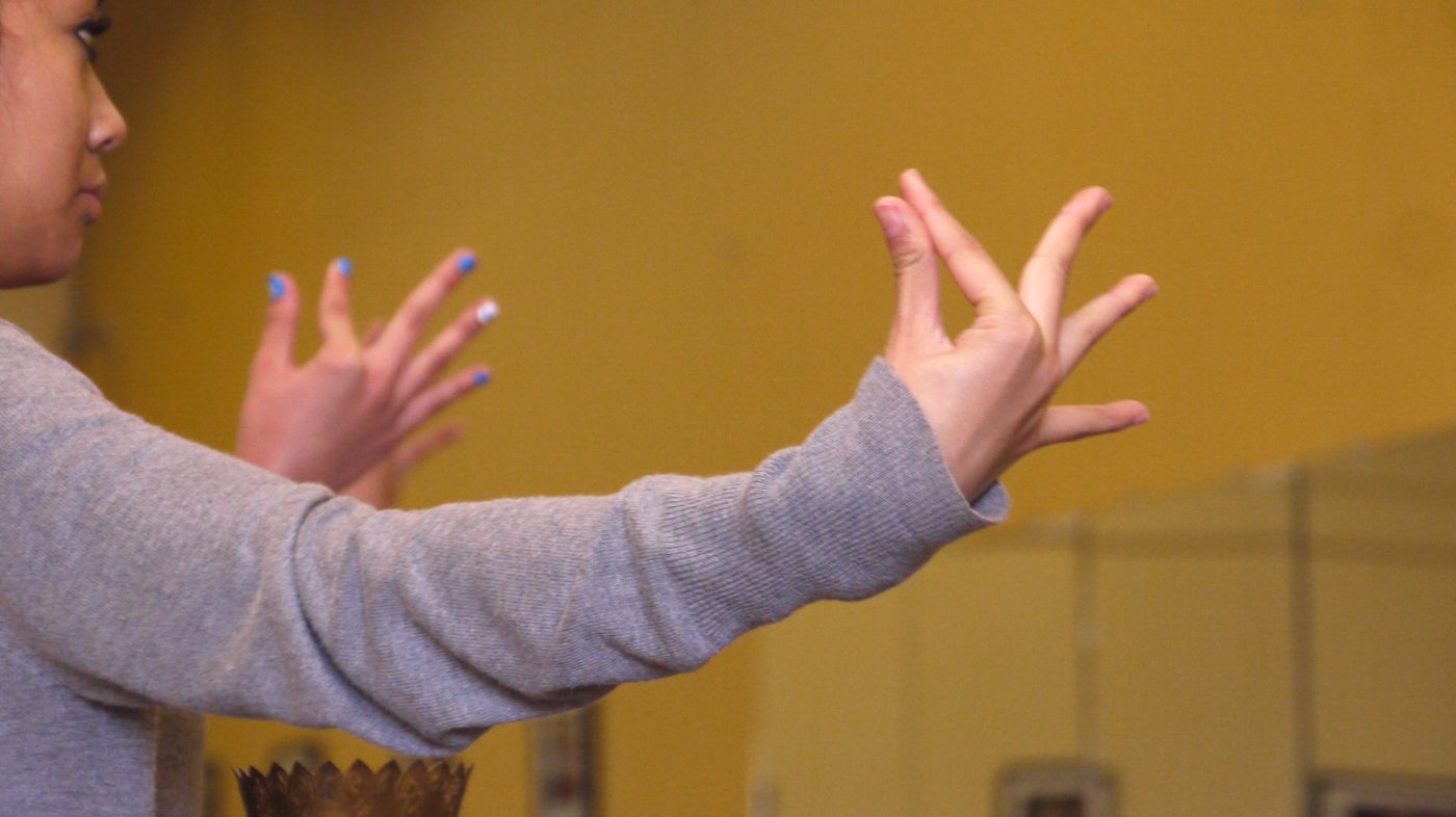 Close-up of a dancer's hands in classical Khmer gesture